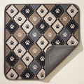 Charcoal Trellis washable pee pad, diamond trellis with a paw in each diamond, one corner turned