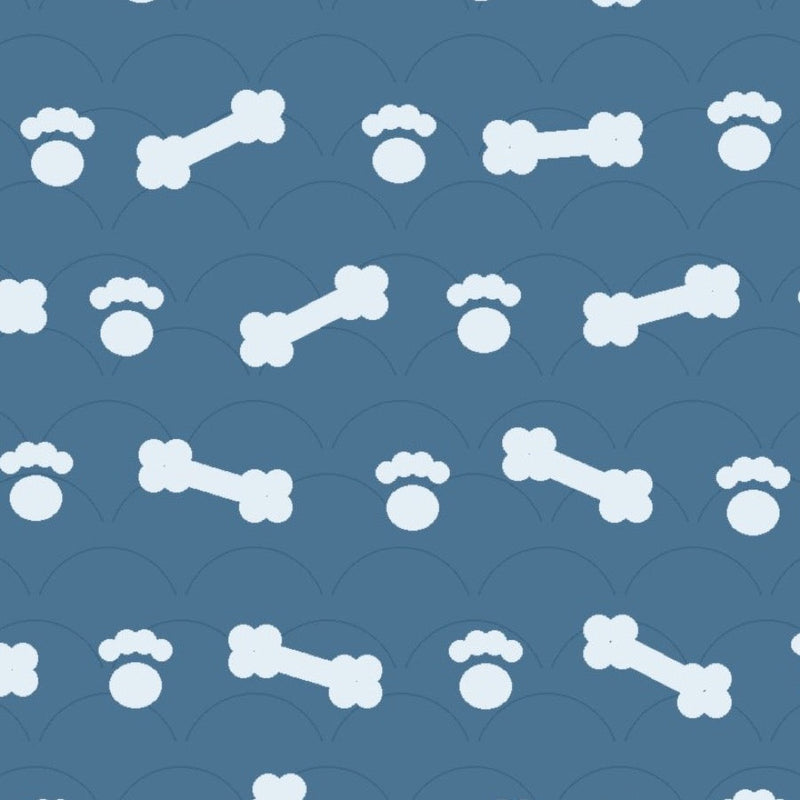 Ocean blue print with pale dog bones and paw prints over faint arches, used on the washable pee pad