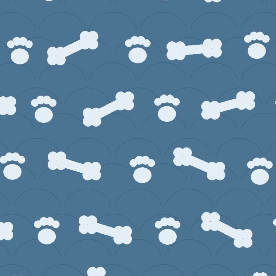 Ocean blue print with pale dog bones and paw prints over faint arches, used on the washable pee pad