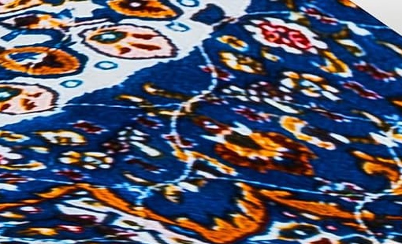 Close-up of the fabric surface showing the quilted stitch pattern used on every print.