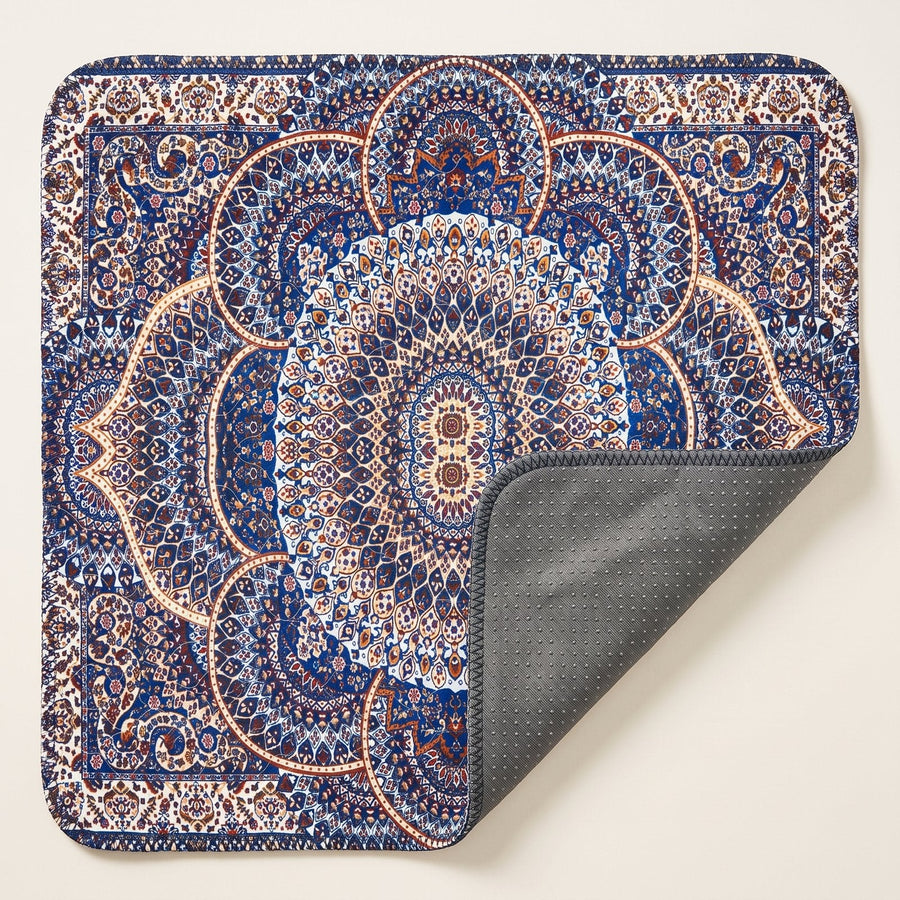 Royal Persian washable pee pad, one corner turned back to show the silicone-dot underside, all four corners rounded to the same radius